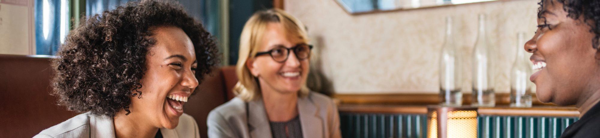 People laughing in a meeting - Photo by rawpixel.com from Pexels